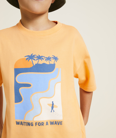 CategoryModel (8824503074958@54)  - Jongens-T-shirt met korte mouwen in fluorescerend oranje biokatoen met surfthema