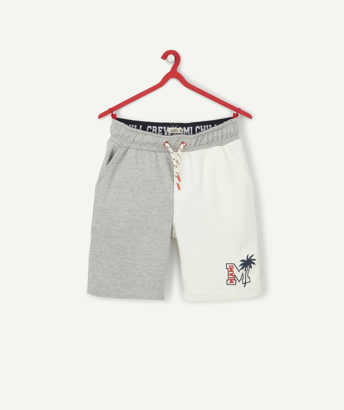   - GRIJS-WIT FLEECE BERMUDASHORTS MET PALMBOOMPATROON